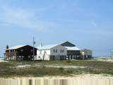 Fort Morgan beach houses on stilts to protect from hurricanes