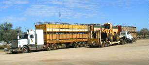 Road train with normal "wide load" in front